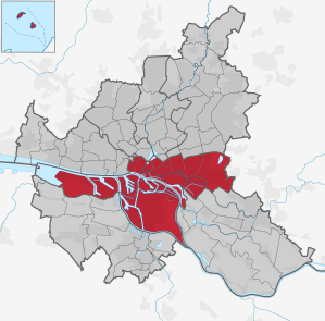 eine Karte der hamburgischen Stadtteile und Bezirke. Der Bezirk Hamburg-Mitte ist in rot hervorgehoben